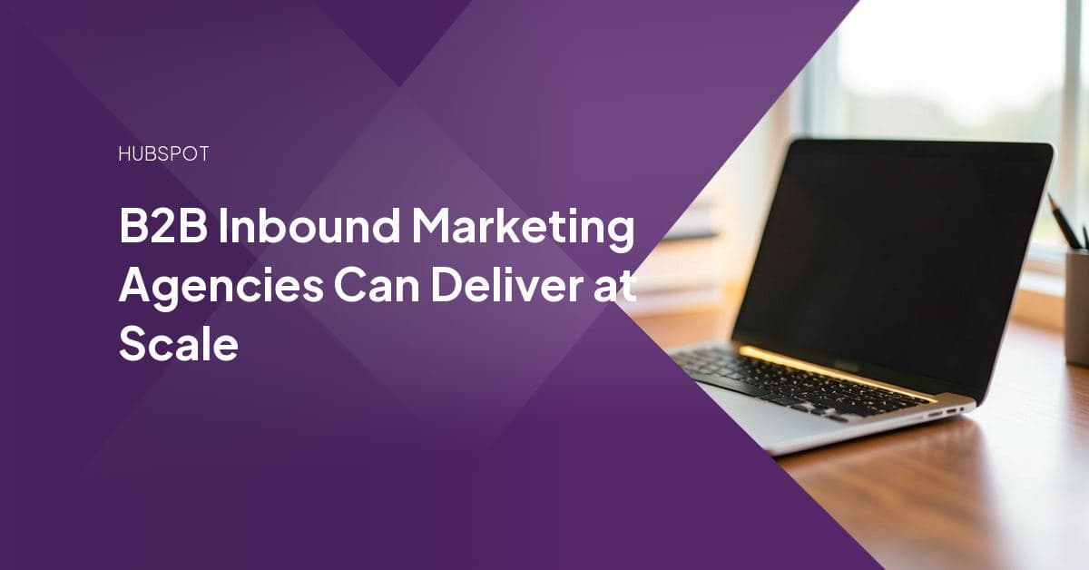 A marketing team reviewing a B2B inbound content calendar and HubSpot attribution dashboard on a laptop screen.
