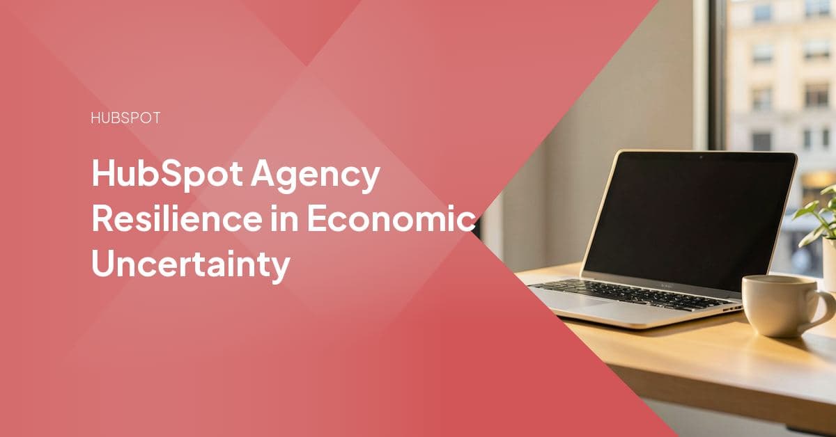 An agency owner reviewing retainer revenue and capacity charts on a dashboard while planning for economic uncertainty