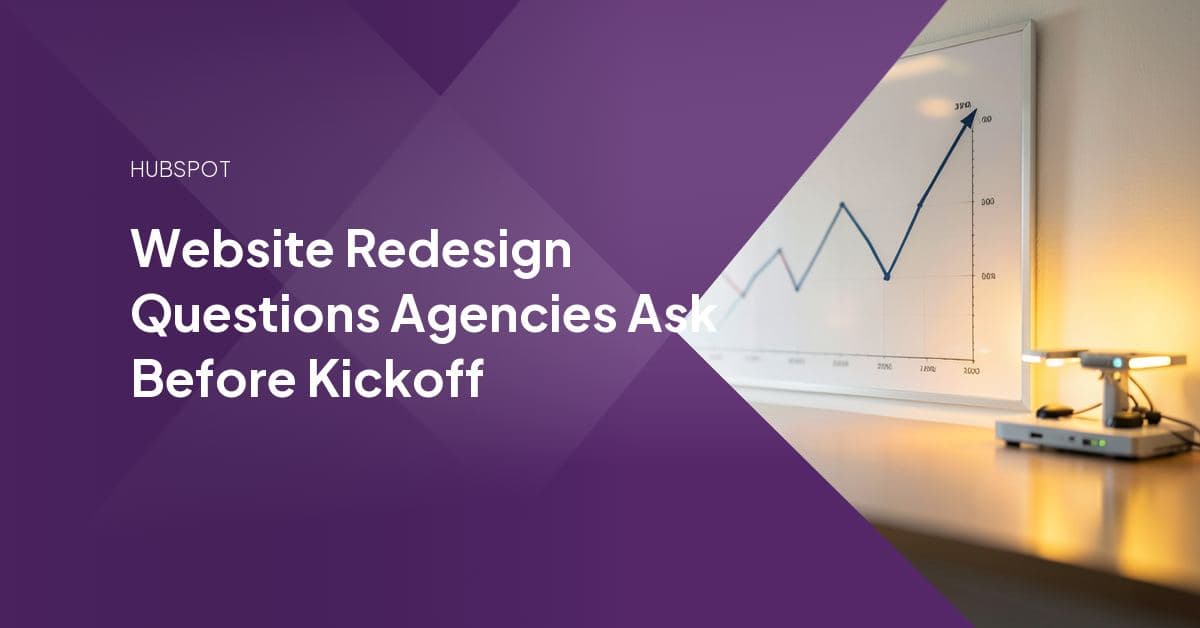 An agency designer and client reviewing wireframes and a discovery checklist during a website redesign kickoff meeting.